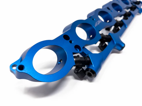 b58-port-injection-rail-blue.webp